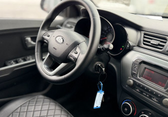 Подержанный автомобиль Kia Rio Sedan 2013 года (11 фото)