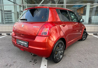 Подержанный автомобиль Suzuki Swift Hatchback 2010 года (5 фото)