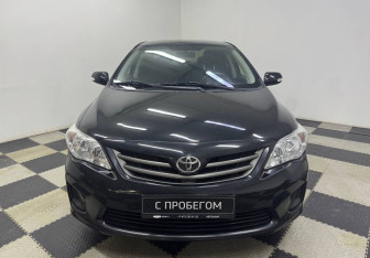 Подержанный автомобиль Toyota Corolla Sedan 2012 года (2 фото)