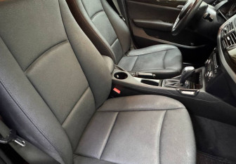 Подержанный автомобиль BMW X1 2011 года (9 фото)