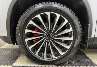 Подержанный автомобиль Exeed TXL 2023 года (13 фото)