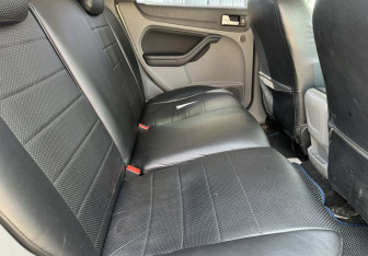 Подержанный автомобиль Ford Focus Hatchback 2011 года (11 фото)