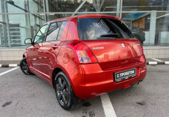 Подержанный автомобиль Suzuki Swift Hatchback 2010 года (7 фото)