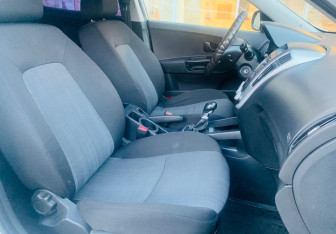 Подержанный автомобиль Kia Ceed Hatchback 2013 года (9 фото)