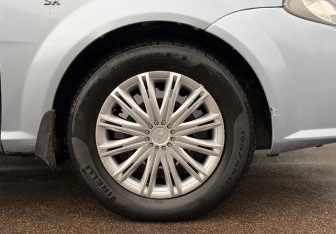 Подержанный автомобиль Daewoo Gentra Sedan 2014 года (12 фото)