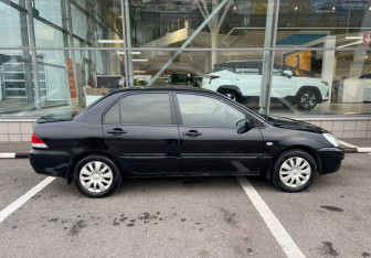 Подержанный автомобиль Mitsubishi Lancer Sedan 2006 года (4 фото)