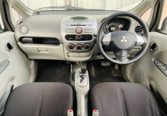 Подержанный автомобиль Mitsubishi i 2006 года (9 фото)