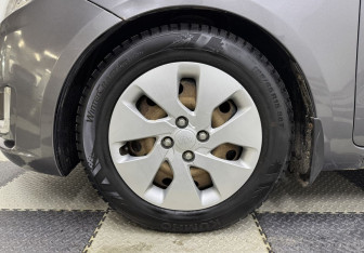 Подержанный автомобиль Kia Rio Sedan 2013 года (12 фото)