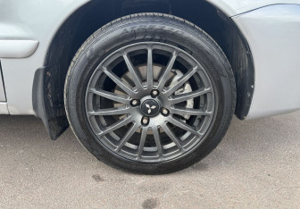Подержанный автомобиль Mitsubishi Lancer Sedan 2006 года (12 фото)