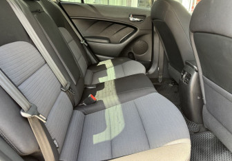 Подержанный автомобиль Kia Cerato Sedan 2013 года (11 фото)