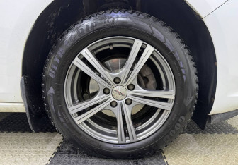 Подержанный автомобиль Opel Astra Sedan 2014 года (12 фото)